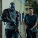 Mike Colter as Louis Gaspare and Gerard Butler as Brodie Torrance in Plane
